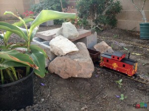 Mr. DAPs Garden Railway - First Attempt - Rocks Go Atop the Cinder Blocks