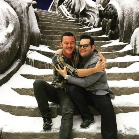 Josh Gad and Luke Evans embrace after Disney's Live-Action Beauty and the Beast wraps.