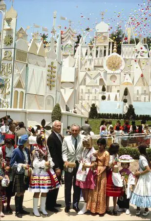 WALT'S SMALL WORLD -- For it's opening at Disneyland, Walt Disney, together with children representing the world's nations, poured water collected from the major rivers, seas and oceans of the globe into the Seven Seaways canal that carries visitors in boats through the attraction.  One of the most popular Disney attractions of all time, the show is a fun-filled and whimsical salute to the children of the world that conveys its message of peace and harmony through the international language of music.  ©2006 Disney Enterprises